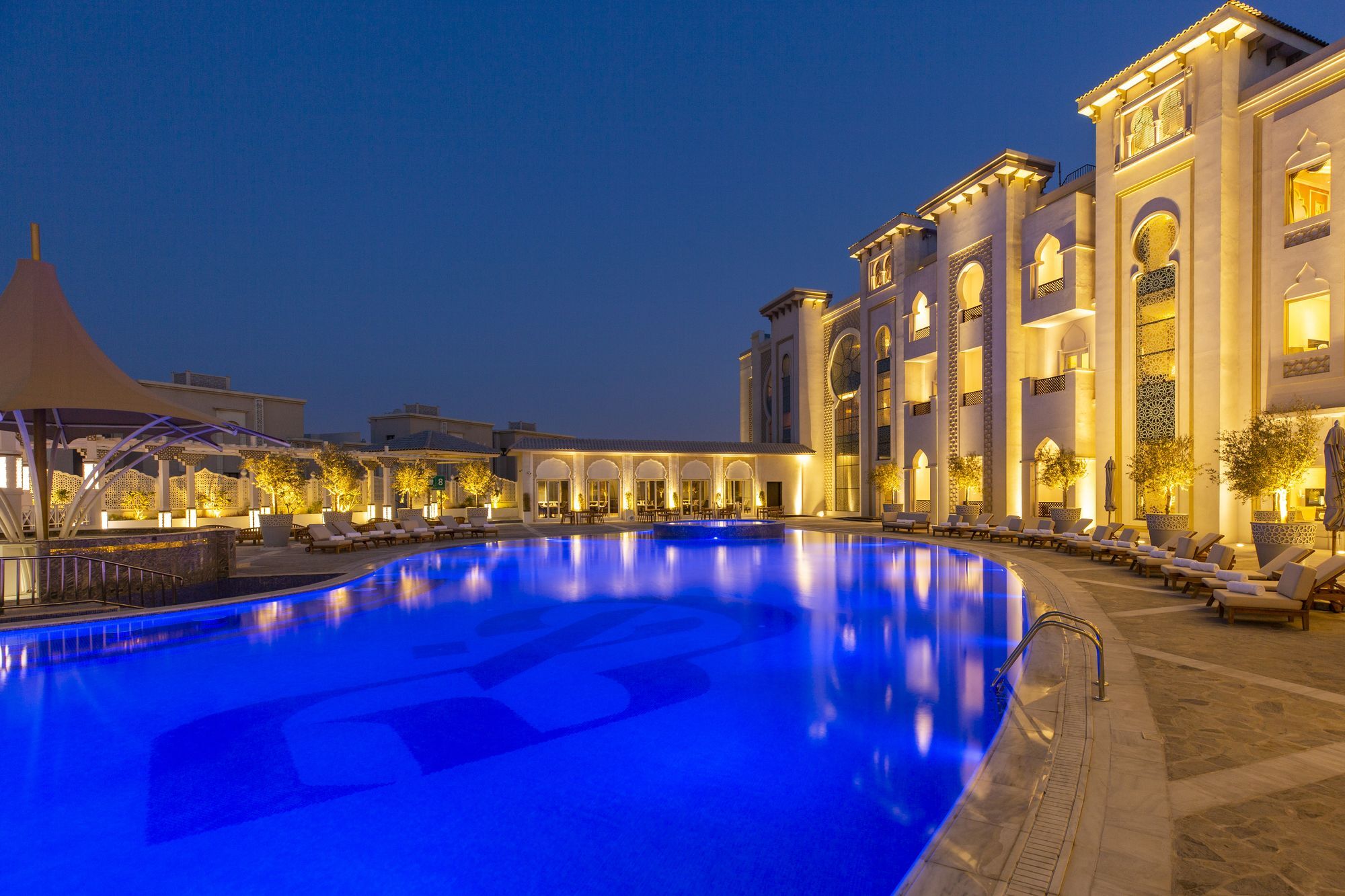 Ezdan Palace Hotel Doha Exterior foto The pool at the Taj Mahal Palace, Mumbai